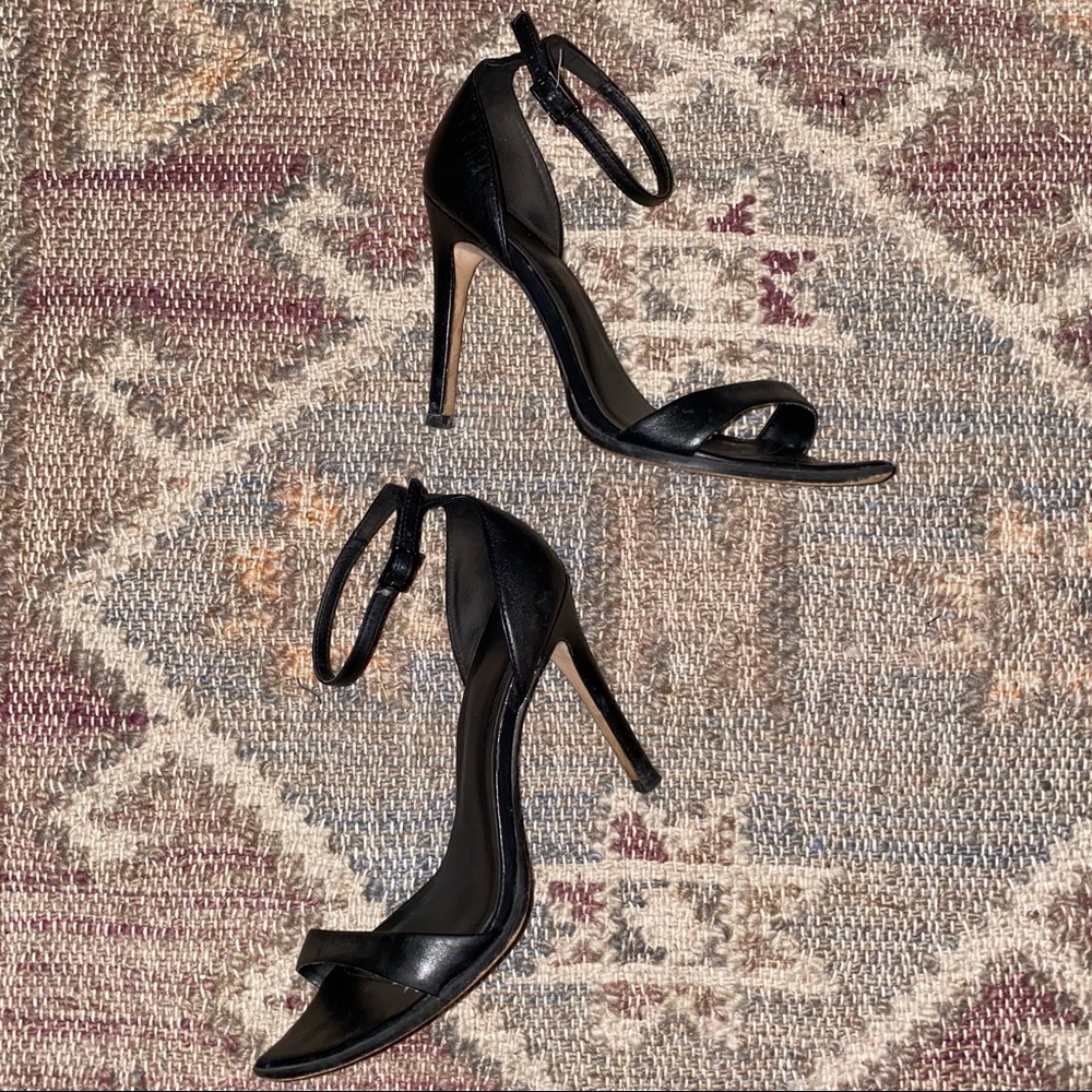 Black high heeled strappy sandals